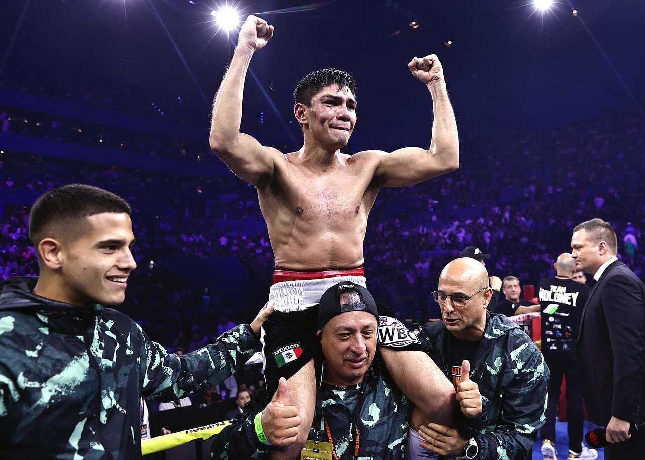 CUBOX fight team champion lifted in celebration